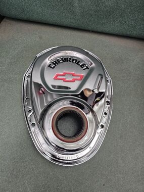 Chrome Engine Timing Cover with Red Bowtie Accent Proform 14q-904